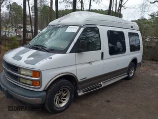 2002 Chevrolet Chevy Van z VIN 1GBFG15MX21125029, wystawiony jako IAAI lot #41740176 z przebiegiem Nie podano mil oraz . Historia ofert i sprzedaży dostępna na DreamBid. Obrazek 2.