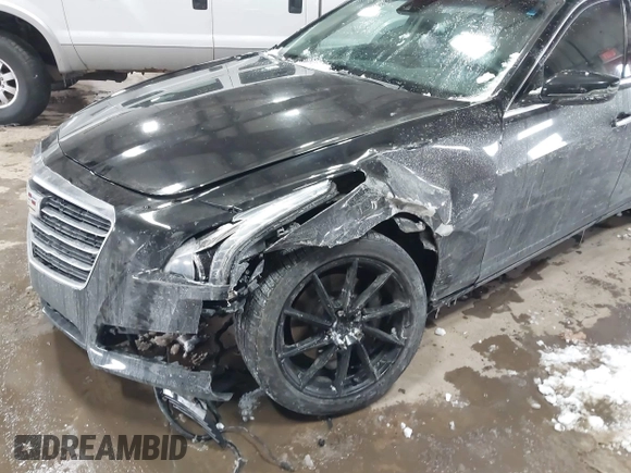 2016 Cadillac CTS Luxury Collection AWD with VIN 1G6AX5SX6G0111768, listed as a IAAI auction lot 41563991 with 76,718 mi miles and . Bid and sale history available at DreamBid. Image 6.