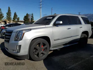 2015 Cadillac Escalade Premium z VIN 1GYS3CKJ7FR104071, wystawiony jako Copart lot #56358665 z przebiegiem 120 923 mil mil oraz Szkody całkowita. Historia ofert i sprzedaży dostępna na DreamBid. Obrazek 1.