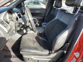 2017 Jeep Grand Cherokee Trailhawk with VIN 1C4RJFLT0HC667691, listed as a Copart auction lot 42041705 with 129,757 mi miles and Salvage title. Bid and sale history available at DreamBid. Image 7.