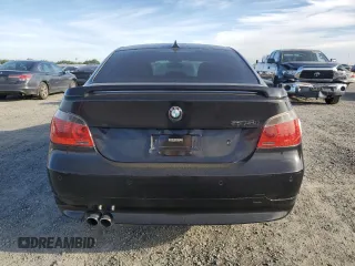 2005 BMW 5 Series 545i with VIN WBANB33565CN65980, listed as a Copart auction lot 52961975 with 143,772 mi miles and Salvage Title. Bid and sale history available at carsss.com. Image 6.