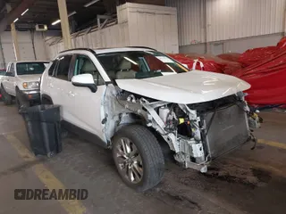 2020 Toyota RAV4 XLE Premium with VIN 2T3C1RFV1LC042163, listed as a IAAI auction lot 40672979 with 76,016 mi miles. Bid and sale history available at carsss.com. Image 1.