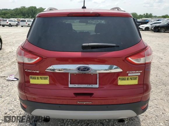 2015 Ford Escape Titanium with VIN 1FMCU0JX5FUC90567, listed as a Copart auction lot 60340775 with 67,287 mi miles and Salvage title. Bid and sale history available at DreamBid. Image 6.