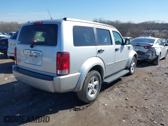 2007 Dodge Nitro SLT with VIN 1D8GT58K77W614092, listed as a IAAI auction lot 41645991 with 129,931 mi miles. Bid and sale history available at carsss.com. Image 4.