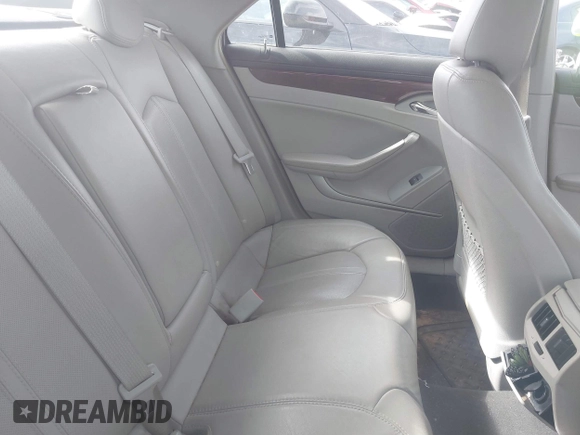 2012 Cadillac CTS Luxury with VIN 1G6DE5E58C0143175, listed as a IAAI auction lot 41612743 with 148,764 mi miles and . Bid and sale history available at DreamBid. Image 8.
