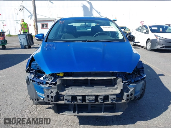 2018 Ford Focus SE z VIN 1FADP3FE4JL279265, wystawiony jako IAAI lot #42068130 z przebiegiem 43 616 mil mil oraz . Historia ofert i sprzedaży dostępna na DreamBid. Obrazek 13.