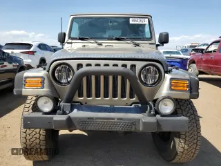2004 Jeep Wrangler Rubicon with VIN 1J4FA69S64P751349, listed as a Copart auction lot 69642624 with 160,589 mi miles and Salvage Title. Bid and sale history available at carsss.com. Image 5.