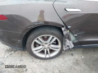 2013 Tesla Model S с VIN 5YJSA1CG0DFP14013, выставлен на аукционе IAAI как лот 42352134 с пробегом 99 996 миль миль и . История ставок и продаж доступна на DreamBid. Изображение 6.