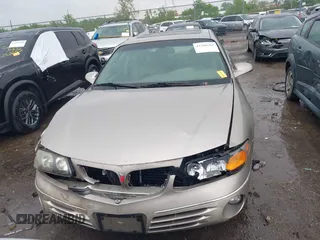 2001 Pontiac Bonneville SE z VIN 1G2HX54K814258899, wystawiony jako IAAI lot #42260783 z przebiegiem 165 869 mil mil oraz . Historia ofert i sprzedaży dostępna na DreamBid. Obrazek 12.