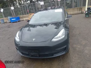 2019 Tesla Model 3 Mid Range with VIN 5YJ3E1EAXKF296378, listed as a IAAI auction lot 41739616 with 77,100 mi miles and . Bid and sale history available at DreamBid. Image 11.