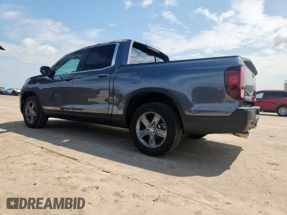 2023 Honda Ridgeline RTL z VIN 5FPYK3F5XPB025508, wystawiony jako Copart lot #64200695 z przebiegiem 3 913 mil mil oraz Szkoda całkowita • Salvage title. Historia ofert i sprzedaży dostępna na DreamBid. Obrazek 2.