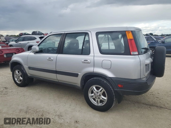 1999 Honda CR-V EX with VIN JHLRD1865XC064542, listed as a Copart auction lot 74730634 with 71,298 mi miles and Salvage Title. Bid and sale history available at carsss.com. Image 2.