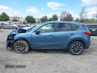 2016 Mazda CX-5 Grand Touring with VIN JM3KE4DY0G0629924, listed as a IAAI auction lot 41878154 with 78,196 mi miles. Bid and sale history available at carsss.com. Image 14.