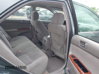 2006 Toyota Camry STD z VIN 4T1BE30K16U109299, wystawiony jako IAAI lot #42305401 z przebiegiem 300 503 mil mil oraz . Historia ofert i sprzedaży dostępna na DreamBid. Obrazek 8.