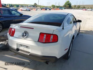 2012 Ford Mustang Premium with VIN 1ZVBP8AM1C5246631, listed as a IAAI auction lot 42345000 with 146,101 mi miles and . Bid and sale history available at DreamBid. Image 4.