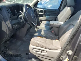 2012 Honda Ridgeline RTL with VIN 5FPYK1F58CB452281, listed as a Copart auction lot 54279455 with 189,314 mi miles and Salvage title. Bid and sale history available at DreamBid. Image 7.