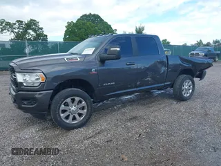 2023 Ram 2500 Big Horn with VIN 3C6UR5DL5PG628593, listed as a IAAI auction lot 42361042 with 38,821 mi miles and . Bid and sale history available at DreamBid. Image 2.