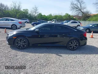 2019 Honda Civic Sport with VIN 19XFC2F86KE045495, listed as a IAAI auction lot 42074631 with 52,864 mi miles and . Bid and sale history available at DreamBid. Image 15.