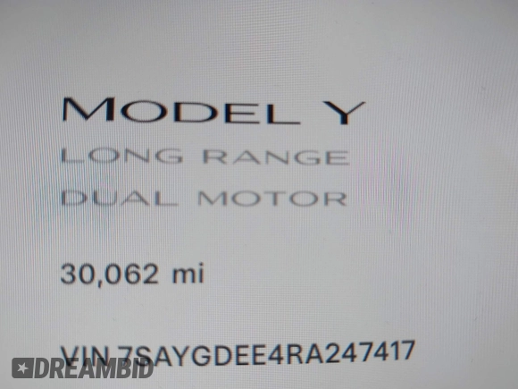 2024 Tesla Model Y Long Range with VIN 7SAYGDEE4RA247417, listed as a IAAI auction lot 41735632 with 30,062 mi miles. Bid and sale history available at carsss.com. Image 7.