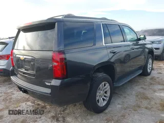 2017 Chevrolet Tahoe LT with VIN 1GNSKBKC3HR206093, listed as a IAAI auction lot 40602629 with 161,740 mi miles and . Bid and sale history available at DreamBid. Image 4.