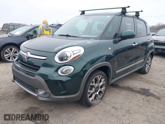 2014 FIAT 500L Trekking with VIN ZFBCFADH5EZ017349, listed as a IAAI auction lot 41528462 with 119,820 mi miles and . Bid and sale history available at DreamBid. Image 2.