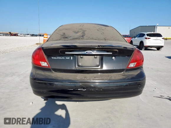 2002 Ford Taurus SE с VIN 1FAFP53252A202836, выставлен на аукционе Copart как лот 62285265 с пробегом 206 916 миль миль и Чистый • Clean title. История ставок и продаж доступна на DreamBid. Изображение 6.