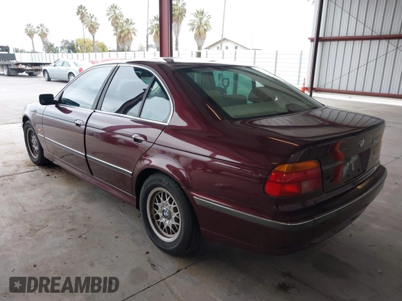 1997 BMW 5 Series 528iA with VIN WBADD6323VBW15656, listed as a IAAI auction lot 41777667 with 142,443 mi miles. Bid and sale history available at carsss.com. Image 3.
