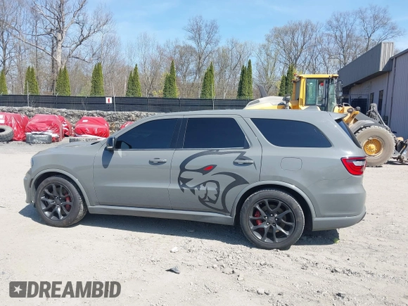 2021 Dodge Durango SRT Hellcat z VIN 1C4SDJH93MC683029, wystawiony jako IAAI lot #41875129 z przebiegiem 31 063 mil mil oraz . Historia ofert i sprzedaży dostępna na DreamBid. Obrazek 14.