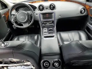 2013 Jaguar XJ с VIN SAJWJ1CD8D8V52463, выставлен на аукционе Copart как лот 61772115 с пробегом 123 899 миль миль и Чистый • Clean title. История ставок и продаж доступна на DreamBid. Изображение 8.