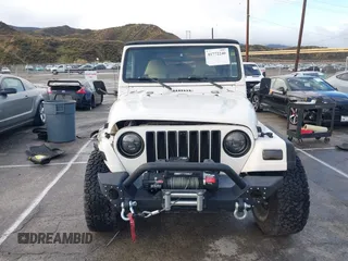 2001 Jeep Wrangler Sport with VIN 1J4FA49S41P308407, listed as a IAAI auction lot 41772240 with 139,461 mi miles. Bid and sale history available at carsss.com. Image 12.