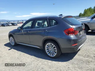 2013 BMW X1 xDrive28i z VIN WBAVL1C5XDVR89392, wystawiony jako Copart lot #55699185 z przebiegiem 127 856 mil mil oraz Czysty tytuł • Clean title. Historia ofert i sprzedaży dostępna na DreamBid. Obrazek 2.