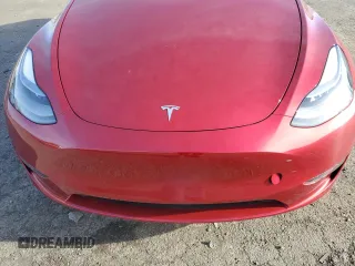 2024 Tesla Model Y Long Range with VIN 7SAYGAEEXRF056411, listed as a Copart auction lot 89218715 with Not Provided miles and Salvage Title. Bid and sale history available at DreamBid. Image 12.