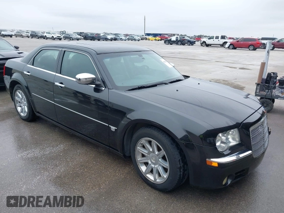 2005 Chrysler 300 with VIN 2C3AA63H45H674987, listed as a IAAI auction lot 41560730 with 101,659 mi miles. Bid and sale history available at carsss.com. Image 1.