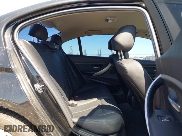 2016 BMW 3 Series 320i with VIN WBA8E1G53GNU11091, listed as a IAAI auction lot 42000088 with 112,711 mi miles and . Bid and sale history available at carsss.com. Image 8.