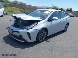 2019 Toyota Prius L Eco with VIN JTDKARFU0K3097075, listed as a IAAI auction lot 41751482 with 16,558 mi miles. Bid and sale history available at carsss.com. Image 2.