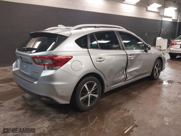 2022 Subaru Impreza Premium with VIN 4S3GTAV62N3720253, listed as a IAAI auction lot 41555999 with 64,684 mi miles. Bid and sale history available at carsss.com. Image 4.