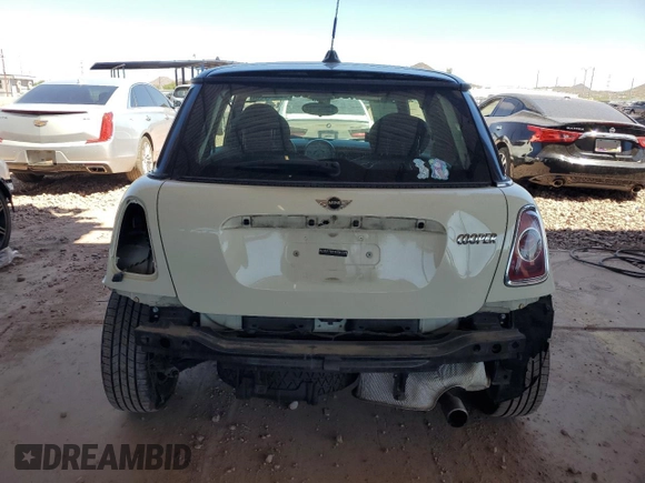 2012 MINI Hardtop z VIN WMWSU3C5XCT542244, wystawiony jako Copart lot #65226525 z przebiegiem 129 512 mil mil oraz Szkoda całkowita • Salvage title. Historia ofert i sprzedaży dostępna na DreamBid. Obrazek 6.