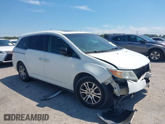 2012 Honda Odyssey EX-L with VIN 5FNRL5H61CB019215, listed as a IAAI auction lot 41837320 with 248,498 mi miles and . Bid and sale history available at DreamBid. Image 1.