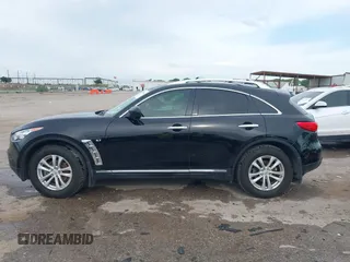 2014 Infiniti QX70 z VIN JN8CS1MU6EM450640, wystawiony jako IAAI lot #42335811 z przebiegiem 143 565 mil mil oraz . Historia ofert i sprzedaży dostępna na DreamBid. Obrazek 15.