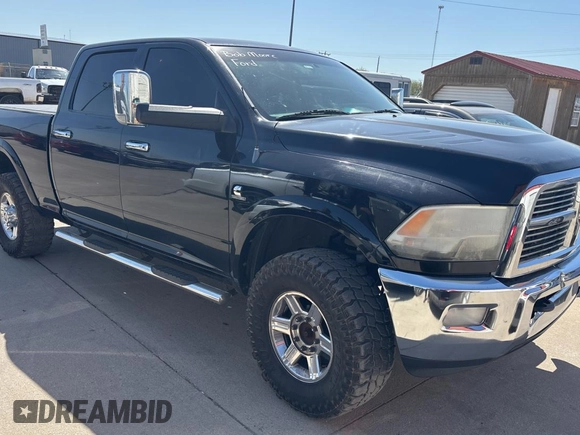 2012 Ram 2500 Laramie with VIN 3C6UD5FL7CG145550, listed as a Copart auction lot 53185415 with 311,929 mi miles and Clean Title. Bid and sale history available at carsss.com. Image 1.