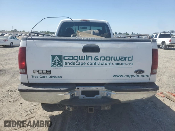 2000 Ford F-250 XL with VIN 1FTNF21F0YEC85459, listed as a Copart auction lot 63040505 with 328,049 mi miles and Salvage title. Bid and sale history available at DreamBid. Image 6.