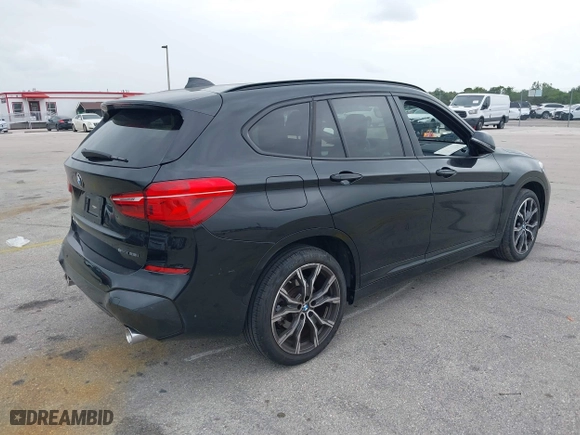 2021 BMW X1 sDrive28i with VIN WBXJG7C05M5U03116, listed as a IAAI auction lot 39837867 with 16,788 mi miles. Bid and sale history available at carsss.com. Image 4.