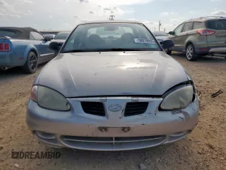 1999 Hyundai Elantra z VIN KMHJF25F1XU777099, wystawiony jako Copart lot #58870035 z przebiegiem 69 470 mil mil oraz Czysty tytuł • Clean title. Historia ofert i sprzedaży dostępna na DreamBid. Obrazek 5.