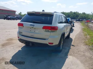 2014 Jeep Grand Cherokee Limited with VIN 1C4RJFBM6EC298194, listed as a IAAI auction lot 42492360 with 170,129 mi miles and . Bid and sale history available at DreamBid. Image 4.