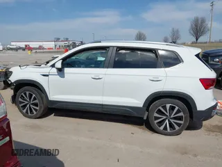 2024 Volkswagen Taos SE z VIN 3VVSX7B25RM071752, wystawiony jako IAAI lot #41775176 z przebiegiem 11 262 mil mil oraz . Historia ofert i sprzedaży dostępna na DreamBid. Obrazek 15.
