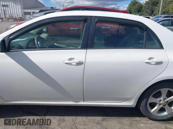 2011 Toyota Corolla L with VIN 2T1BU4EE6BC640408, listed as a IAAI auction lot 40565528 with 134,656 mi miles. Bid and sale history available at carsss.com. Image 14.