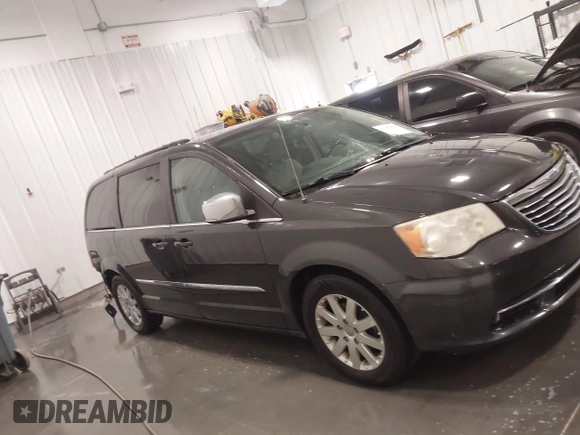 2011 Chrysler Town & Country Touring L with VIN 2A4RR8DG3BR676240, listed as a IAAI auction lot 41980939 with 184,524 mi miles and . Bid and sale history available at DreamBid. Image 13.