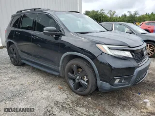 2019 Honda Passport Elite with VIN 5FNYF8H07KB015815, listed as a Copart auction lot 71529484 with 136,228 mi miles and Non Repairable. Bid and sale history available at carsss.com. Image 4.