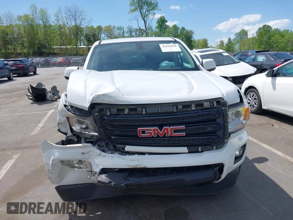 2019 GMC Canyon 4WD SLE z VIN 1GTG6CENXK1319647, wystawiony jako IAAI lot #42039568 z przebiegiem 56 371 mil mil oraz . Historia ofert i sprzedaży dostępna na DreamBid. Obrazek 13.