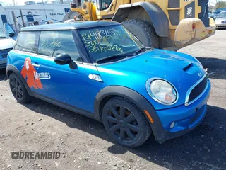2007 MINI Hardtop S with VIN WMWMF73507TT83203, listed as a IAAI auction lot 41832035 with Not Provided miles and . Bid and sale history available at DreamBid. Image 1.